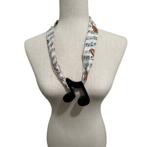 This Is  A Necklace With A Wooden Two - Eighth Note Pendant